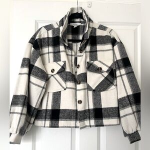 Never worn cropped flannel button down! Smoke free and pet free home.